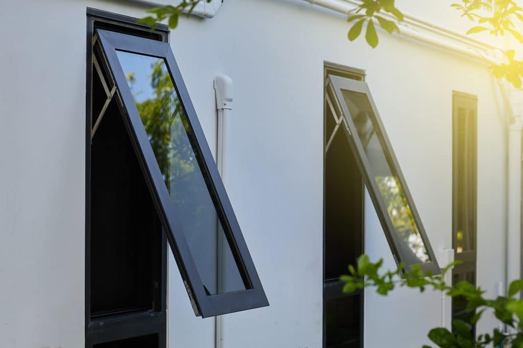 Black frame aluminium windows of building.