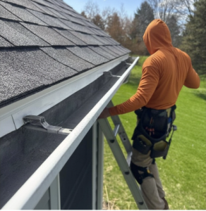 GoTo Roofing contractor working on a home's gutter system